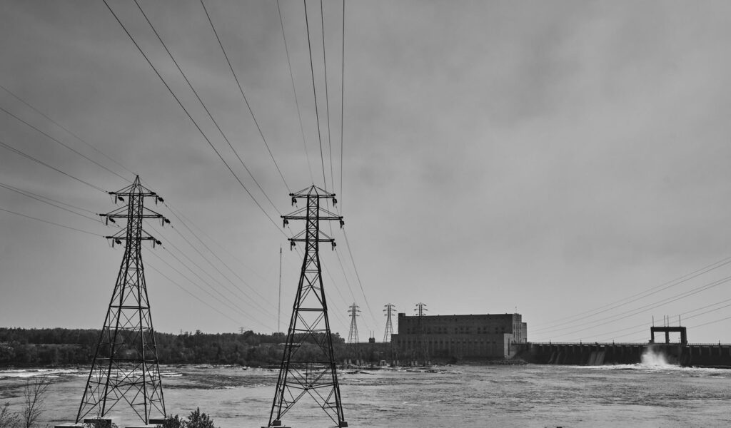 Power lines and a hydro dam across a river